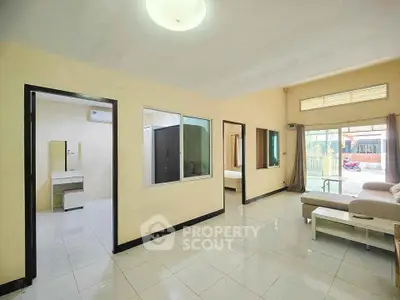 Spacious living area with modern design and ample natural light
