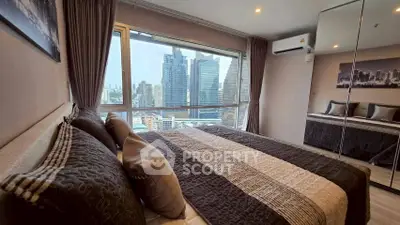 Luxurious bedroom with stunning city view and modern decor