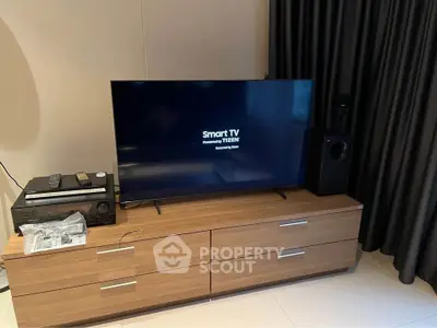 Modern living room with sleek entertainment setup and smart TV