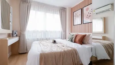 Cozy and stylish bedroom with modern decor and natural light