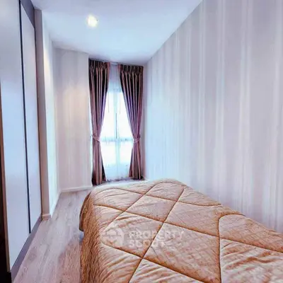 Cozy bedroom with elegant curtains and soft lighting, perfect for relaxation.