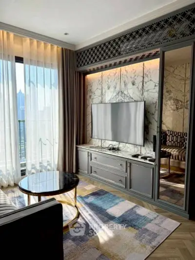 Luxurious living room with marble accents and modern decor in high-rise apartment.