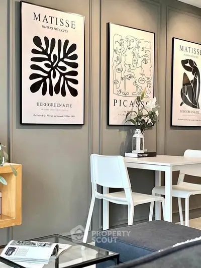 Stylish modern living room with artistic wall decor and sleek furniture