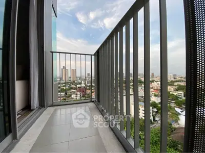 Spacious balcony with stunning city view in modern apartment