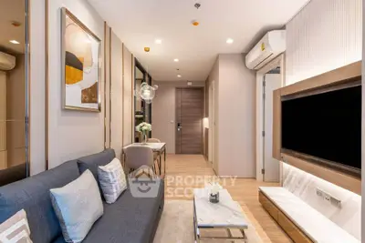 Modern living room with stylish decor and air conditioning in a cozy apartment.