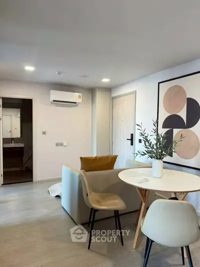 Modern living room with stylish decor and cozy seating area