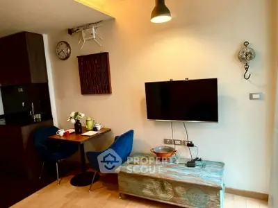 Charming living room with modern decor and cozy dining area in stylish apartment.