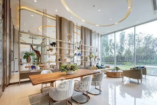 Luxurious modern living room with floor-to-ceiling windows and elegant decor