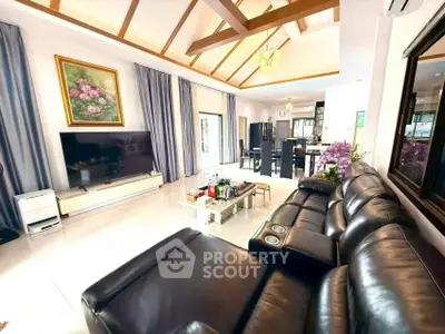 Spacious modern living room with high ceilings and elegant decor
