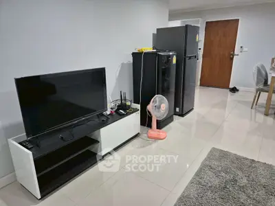 Modern living space with sleek appliances and minimalist decor