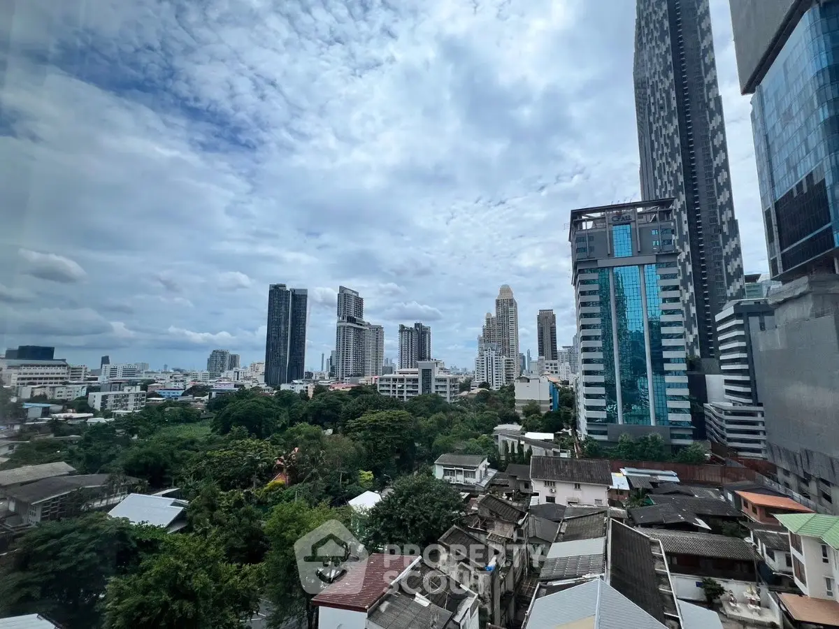Stunning cityscape view showcasing modern skyscrapers and lush greenery, perfect for urban living enthusiasts.