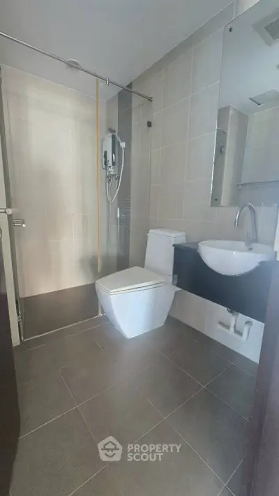Modern bathroom with sleek fixtures and walk-in shower