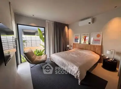 Modern bedroom with large window and stylish decor, featuring a cozy bed and contemporary artwork.