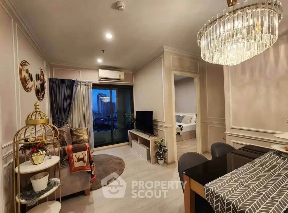 Luxurious living room with elegant decor and modern furnishings in a high-rise apartment.