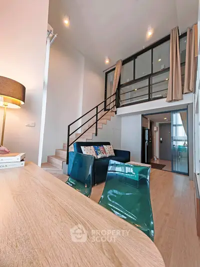 Modern duplex apartment with stylish interior and mezzanine level