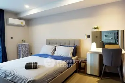 Modern bedroom with stylish decor and cozy ambiance