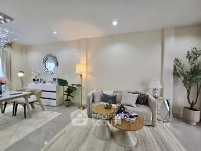 Elegant living room with modern decor and cozy seating area