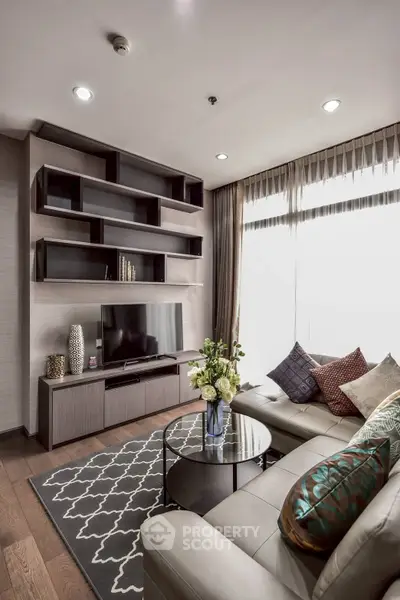 Modern living room with stylish shelving and cozy seating area