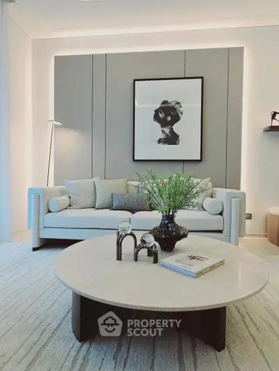 Elegant modern living room with stylish decor and cozy seating area.