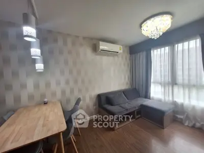 Modern living room with stylish lighting and cozy seating area