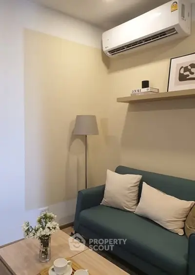 Cozy living room with modern sofa and air conditioning