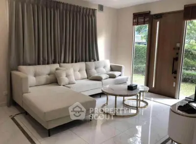 Elegant living room with modern sofa and natural light