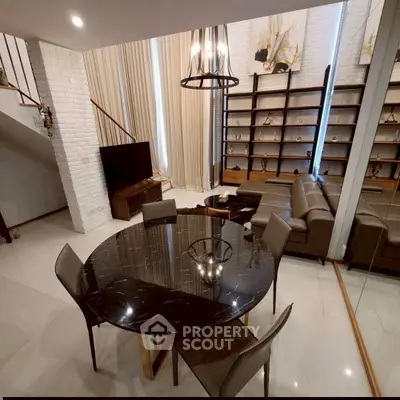 Luxurious modern living room with elegant dining area and stylish decor