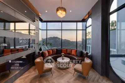 Luxurious living room with panoramic mountain views and elegant decor