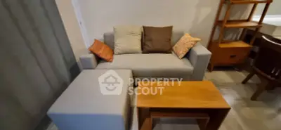 Cozy living room with modern sofa and wooden furniture