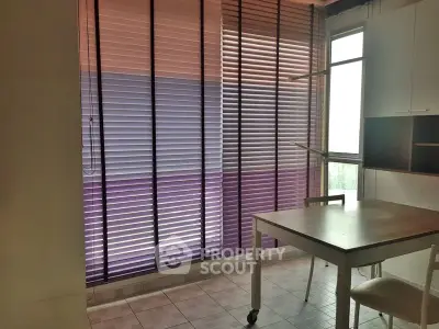 Cozy study room with modern blinds and natural light