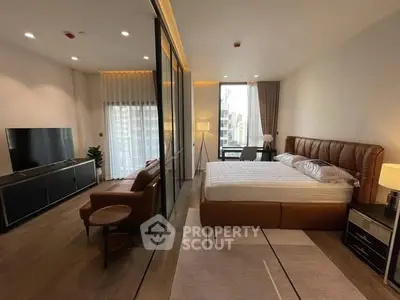 Luxurious modern bedroom with floor-to-ceiling windows and stylish decor
