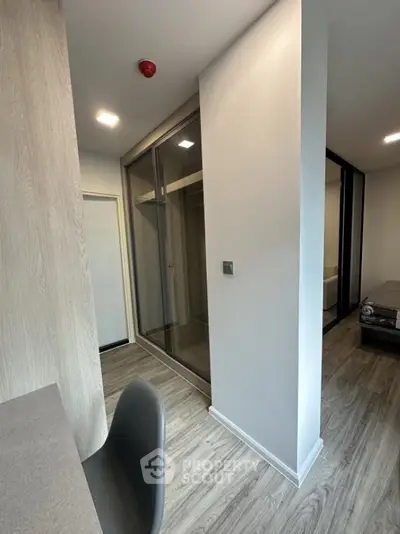 Modern apartment interior with sleek design and wood flooring