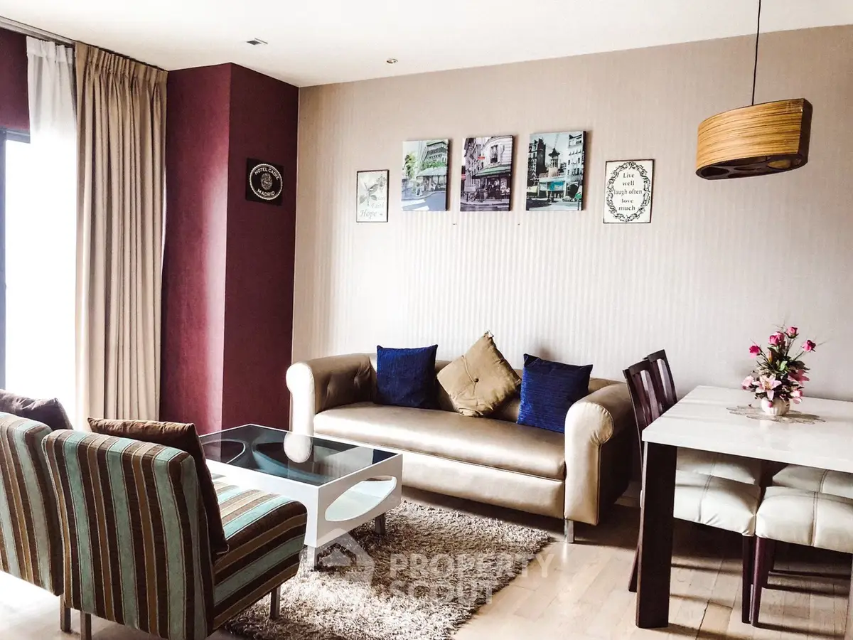 Stylish living room with modern decor and cozy seating area.