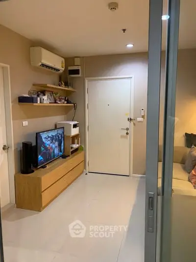 Cozy living room with modern decor and entertainment setup