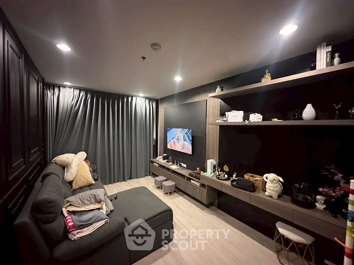 Modern living room with cozy sofa and stylish shelving unit