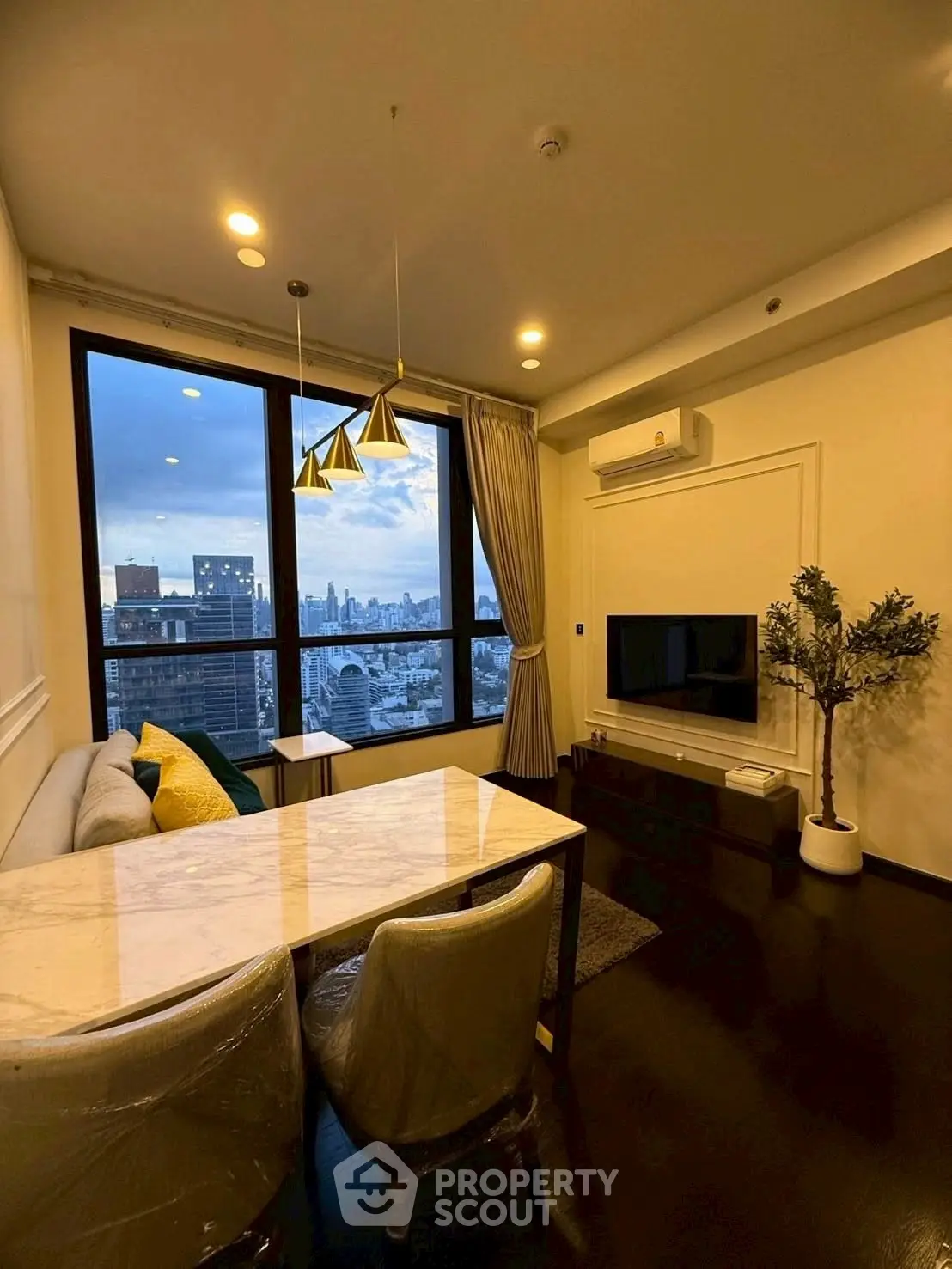 Luxurious living room with stunning city view and elegant decor