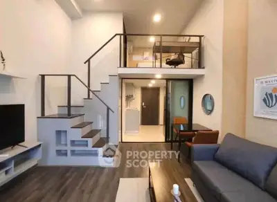 Modern loft apartment with stylish mezzanine and open living area, perfect for urban living.