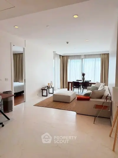 Spacious modern living room with elegant decor and natural light