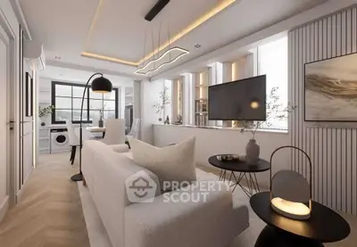 Modern living room with sleek design and open layout, featuring stylish furniture and ambient lighting.
