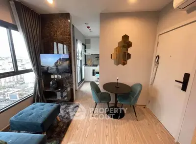 Modern living room with stylish decor and open kitchen layout