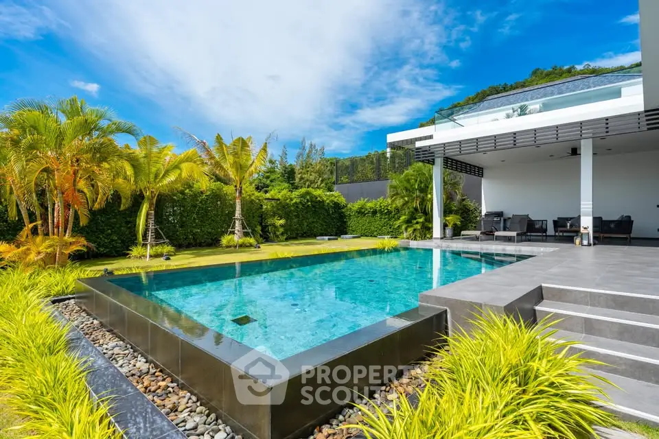 Luxurious modern villa with stunning pool and lush garden