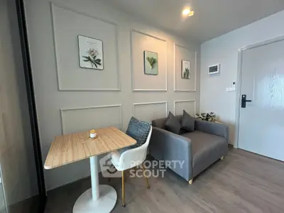 Modern living room with stylish decor and cozy seating area, perfect for relaxation and entertaining.