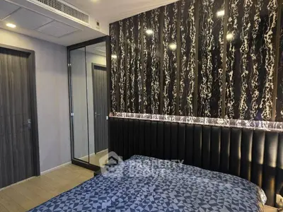 Luxurious bedroom with modern design and mirrored wardrobe