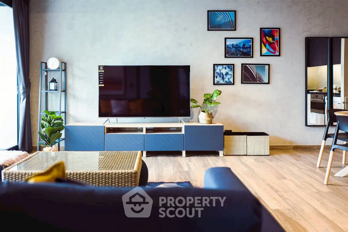 Stylish modern living room with large TV and chic decor
