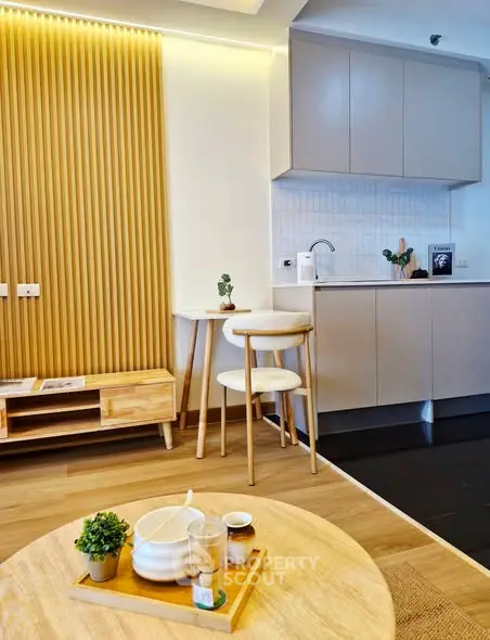 Modern kitchen and dining area with sleek cabinetry and stylish decor