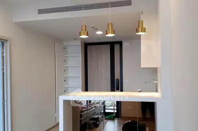 Modern apartment interior with stylish lighting and open layout