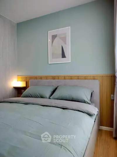 Cozy bedroom with modern decor and soft lighting