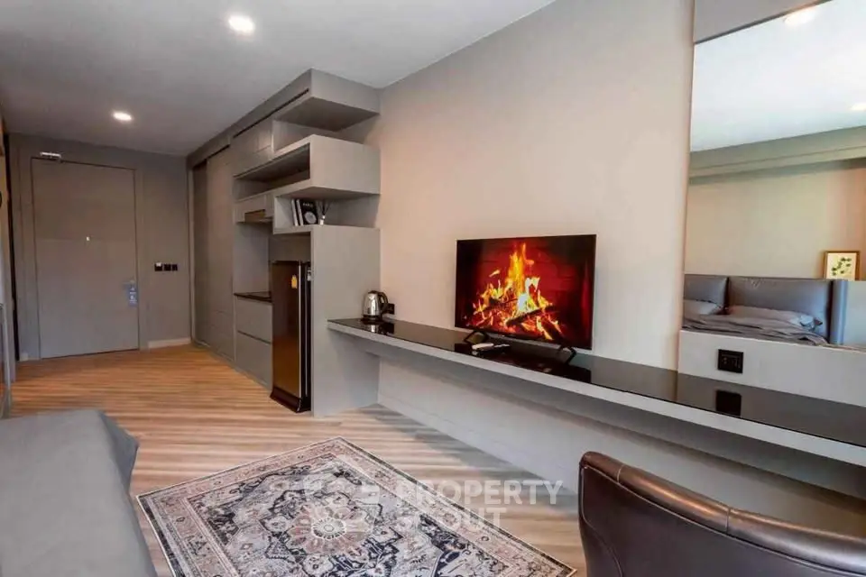 Modern living room with sleek design and cozy fireplace ambiance