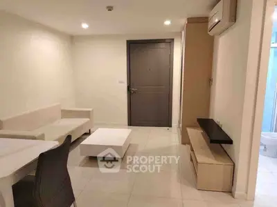 Modern living room with minimalist furniture and neutral tones