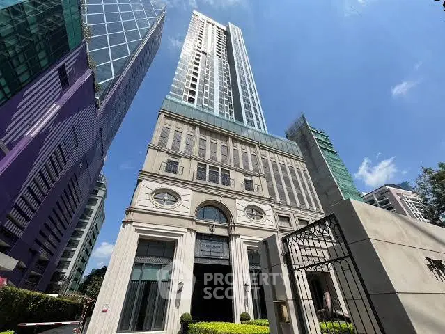 Stunning high-rise building with modern architecture and clear blue sky backdrop.